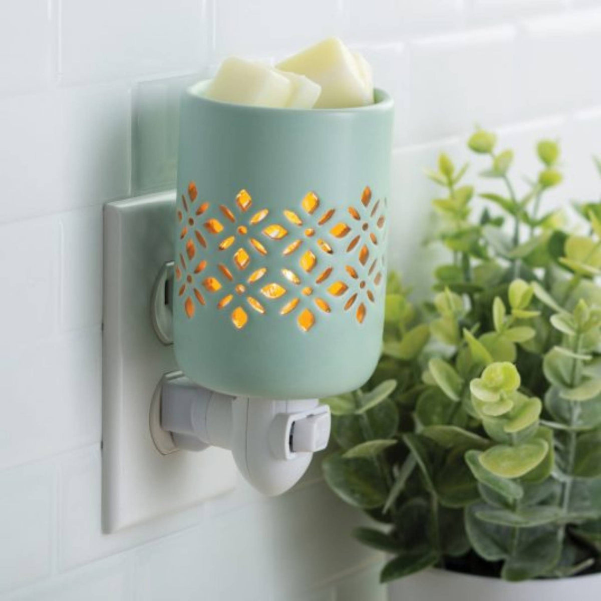 Soft mint pluggable wax warmer with a clean farmhouse design
